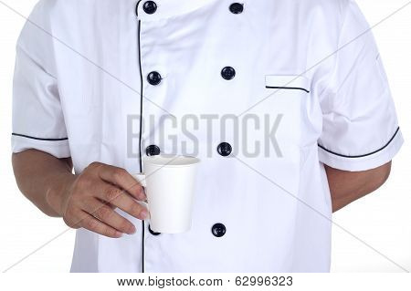 The Male Chef Holding A Papercup Of Coffee