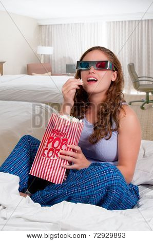Woman In Bed With Popcorn