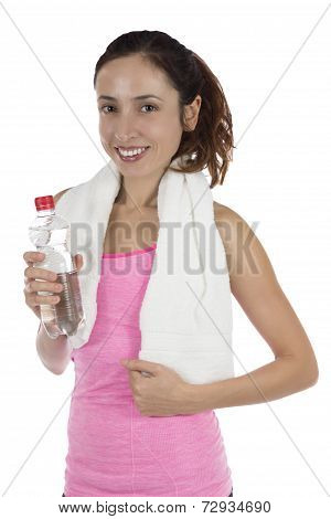 Fit Sporty Woman Holding A Water Bottle With A Towel Around Her Neck