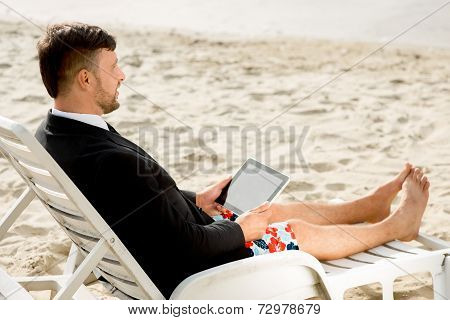 Businessman on the beach