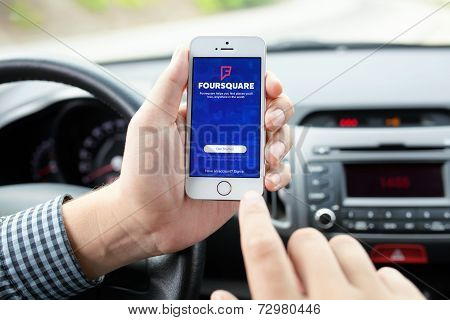 Iphone 5S App Foursquare In Hands Of The Driver Car