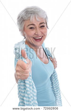 Happy senior woman with thumbs up