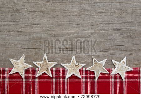 Rustic wooden shabby chic background with a checkered frame for christmas - or a advertising board for publicity or a greeting card