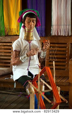A Kayan Lahwi Oldest Woman Is Spinning.