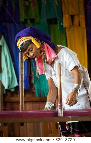 A Kayan Lahwi Oldest Woman Is Spinning.