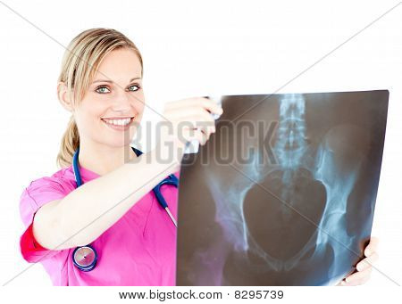 Glowing Young Surgeon Holding A X-ray