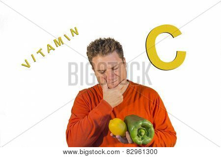 Thoughtful Man Holding Fruits And Vegetables