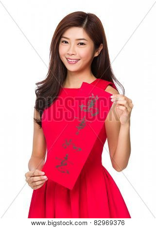 Woman with Fai Chun for Chinese new year, phrase meaning is everything goes smooth 