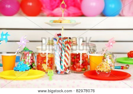 Prepared birthday table with sweets for children party