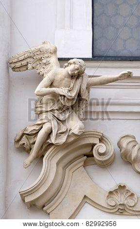 GRAZ, AUSTRIA - JANUARY 10, 2015: Angel on the portal of Mariahilf church in Graz, Styria, Austria on January 10, 2015.