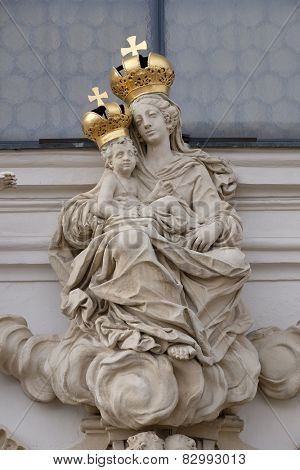 GRAZ, AUSTRIA - JANUARY 10, 2015: Virgin Mary with baby Jesus on the portal of Mariahilf church in Graz, Styria, Austria on January 10, 2015.