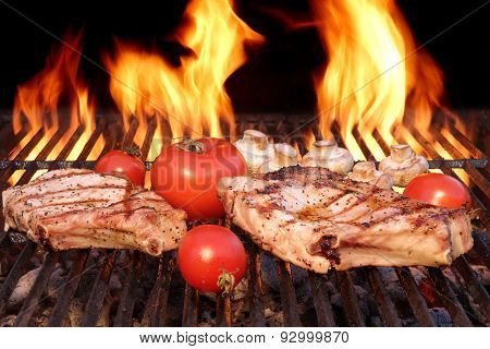 Pork Rib Steak, Tomato And Mushrooms On Hot Bbq Grill
