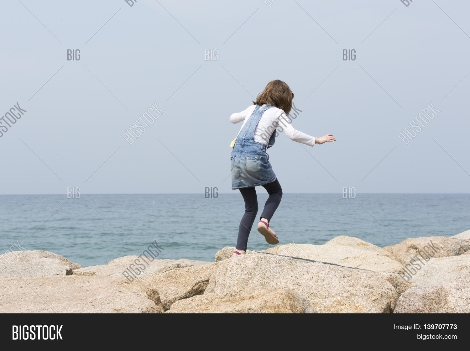 Little Girl Jumping On Image & Photo (Free Trial) | Bigstock