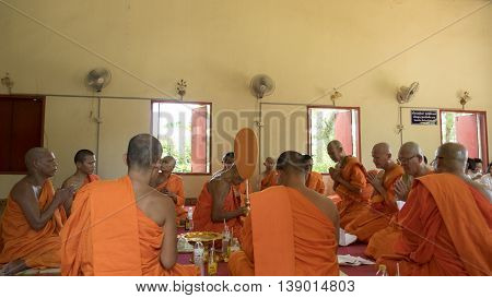 Man Who Will Become Buddhism Monk Praying In Ordination Ceremony