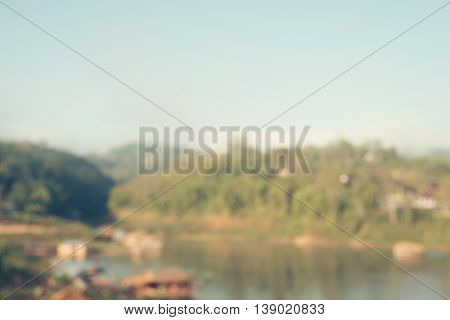 Blurred background : Old Wooden Bridge at Sangkhlaburi Thailand.