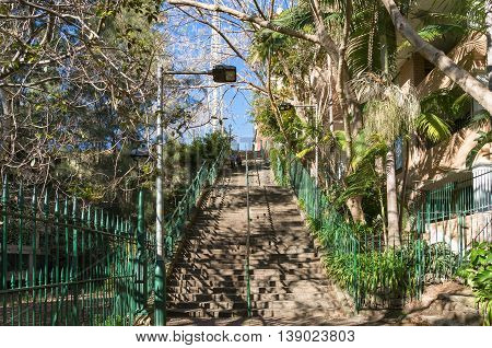 Sydney Australia - Jul 03 2016: Famous McElhone Stairs connecting Potts Point suburb with Woolloomooloo and CBD. The stairs are a key thoroughfare for residents to access the city