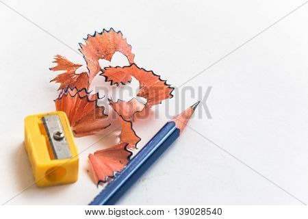 Pencil And Pencil Sharperner On White Background
