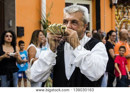 SELARGIUS, ITALY - September 13, 2015: Former marriage Selargino - Sardinia - portrait of a musician in traditional Sardinian costume