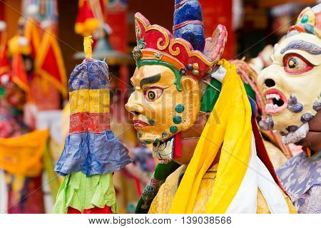 LAMAYURU INDIA - JUNE 13 2015: Unidentified buddhist lamas dressed in mystical mask dancing Tsam mystery dance in time of Yuru Kabgyat Buddhist festival at Lamayuru Gompa Ladakh North India