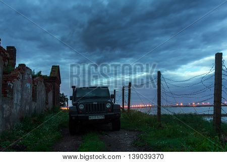 Leningrad region, Russia , July 12, 2016 , Jeep Wrangler on the first North Fort in Kronstadt, the Jeep Wrangler is a compact four wheel drive off road and sport utility vehicle