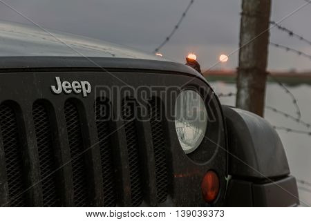 Leningrad region, Russia , July 12, 2016 , Jeep Wrangler on the first North Fort in Kronstadt, the Jeep Wrangler is a compact four wheel drive off road and sport utility vehicle