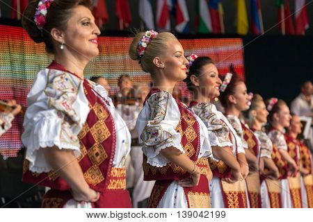 ROMANIA TIMISOARA - JULY 8 2016: Romanian dancers in traditional costume present at the international folk festival "International Festival of hearts" organized by the City Hall Timisoara.