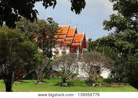 beautiful Buddhist temple gable, in forest of Thailand
