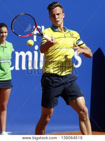 BARCELONA - APRIL,19: Hungarian tennis player Marton Fucsovics in action during a match of Barcelona tennis tournament Conde de Godo on April 19, 2016 in Barcelona