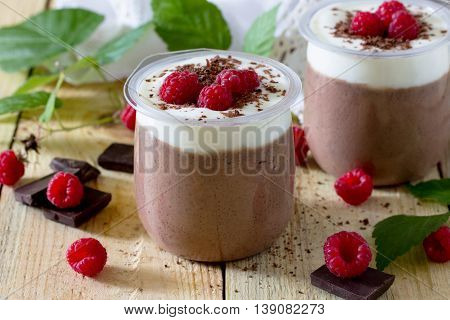 Homemade Chocolate Mousse With Raspberries On A Wooden Table, Selective Focus.