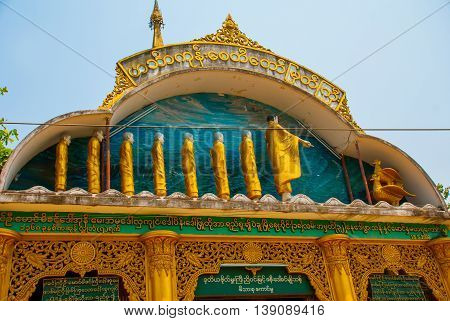 The Image Of Two Gold Birds. Pagoda In The Town Of Bago, Pegu. Myanmar. Burma.