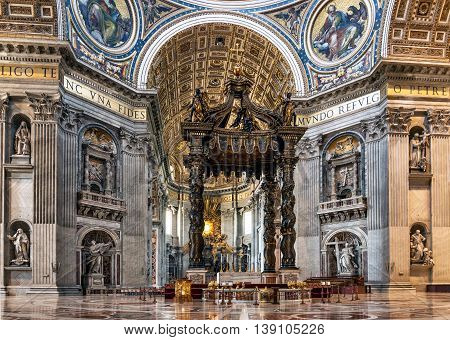 VATICANROME ITALY - JULY 1 2016: Beautiful sculptural decoration on the wall of central nave in interior of the St. Peter's Cathedral. Europe.
