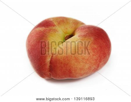 Flat peach on white background, Persica platicarpa, closeup