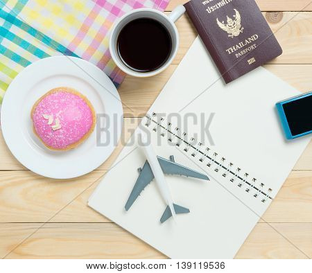 Travel Blogger stuffs Open book for copy space in vintage tone