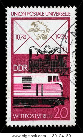 ZAGREB, CROATIA - JULY 02: a stamp printed in GDR shows Old Steam Locomotive and Modern Diesel, Centenary of the UPU, circa 1974, on July 02, 2014, Zagreb, Croatia