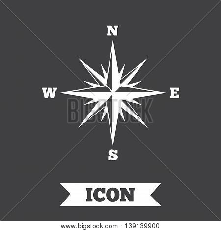 Compass sign icon. Windrose navigation symbol. Graphic design element. Flat windrose compass symbol on dark background. Vector