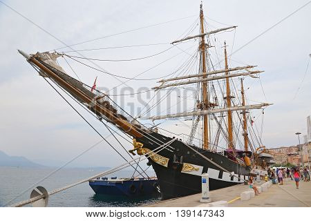 GAETA, ITALY - JUNE 25, 2016: The three masted Palinuro, a historic Italian Navy training barquentine, moored in the Gaeta port.