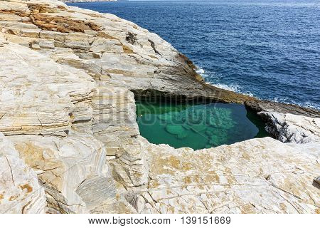 Green waters of Giola Natural Pool in Thassos island, East Macedonia and Thrace, Greece