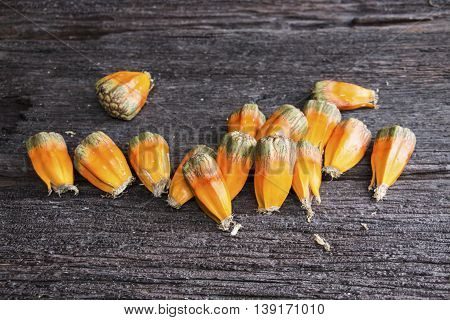 Pandan fruit are on the wooden table