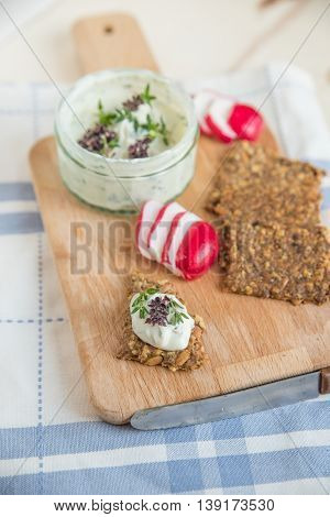 home made whole grain crisp bread with dip