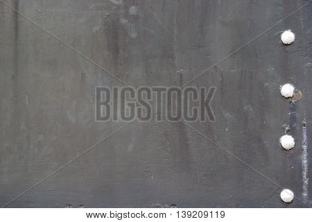Black color metal plate background close up