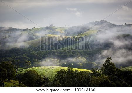 Atherton Tablelands on a misty winter's morning in Queensland, Australia