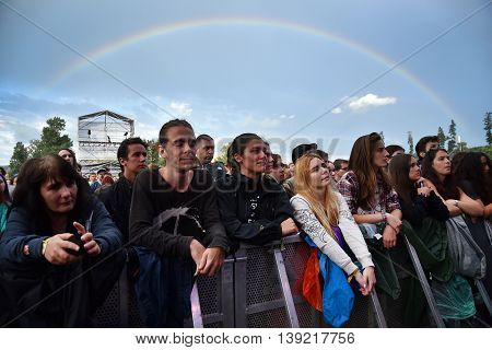 Rainbow Over Cheering Crowd