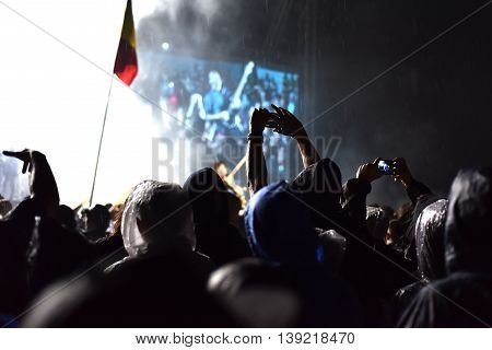 Guitarist Crowd Surfing During A Concert