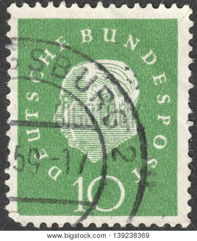 MOSCOW RUSSIA - CIRCA JANUARY 2016: a stamp printed in GERMANY shows a portrait of Theodor Heuss the series 