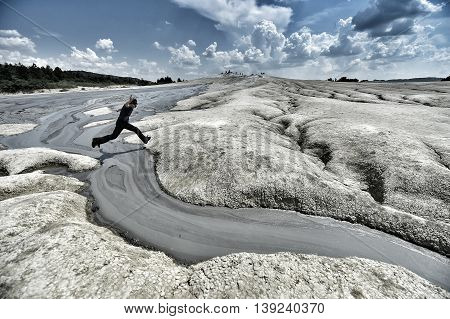 BERCA ROMANIA - JULY 2: Tourists visiting the mud active volcanoes in Berca on June 2 2016 in Romania