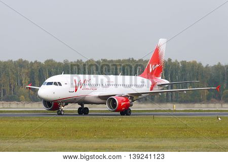 MOSCOW, RUSSIA - SEPTEMBER 26, 2014: Airbus A319-111 Vim Airlines taxiing. Plane makes taxiing on taxiway Domodedovo International Airport.