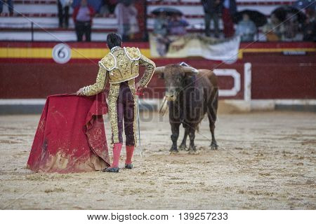 Jaen SPAIN - October 18 2008: The Spanish Bullfighter Sebastian Castella during a rainy afternoon bullfighting with the crutch in the Bullring of Jaen Spain