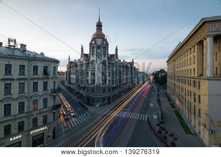 ST. PETERSBURG, RUSSIA - JUL 25, 2015: Building with spire at corner of Sadovaya Street and Voznesensky Prospect in white night 