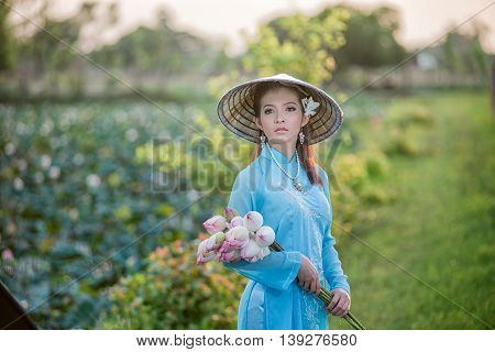 Asian Office Woman, Ao Dai Is Famous Traditional Costume For Woman In Vietnam