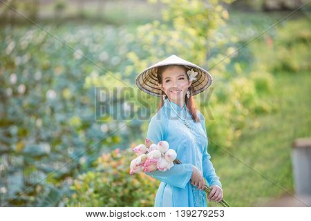 Asian Office Woman, Ao Dai Is Famous Traditional Costume For Woman In Vietnam